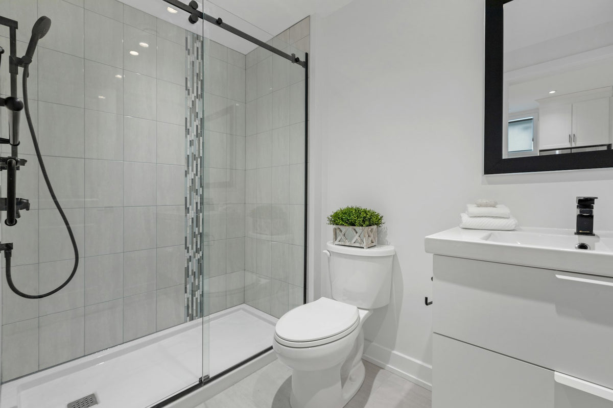 Bright bathroom with a glass shower enclosure